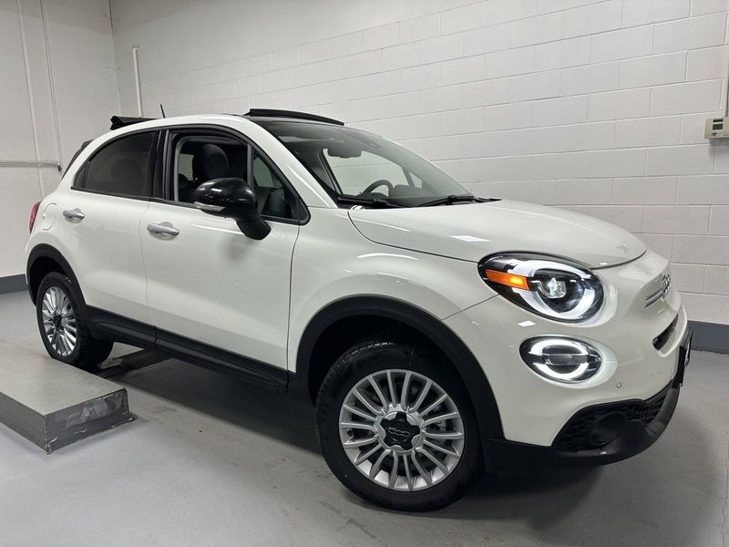 2023 Fiat 500x Pop Awd in a Bianco Gelato (White Clear Coat) exterior color and Blackinterior. Schmelz Countryside Alfa Romeo and Fiat (651) 968-0556 schmelzfiat.com 