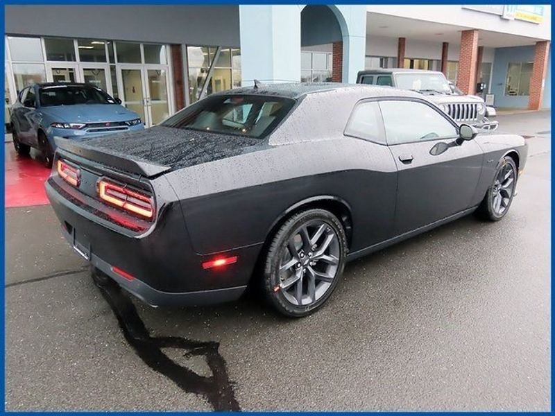 2023 Dodge Challenger R/T in a Pitch-Black exterior color and Blackinterior. Papas Jeep Ram In New Britain, CT 860-356-0523 papasjeepram.com 