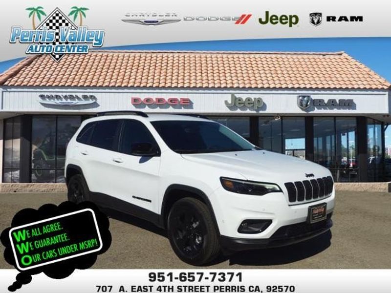 2023 Jeep Cherokee Altitude in a Bright White Clear Coat exterior color and Blackinterior. Perris Valley Auto Center 951-657-6100 perrisvalleyautocenter.com 