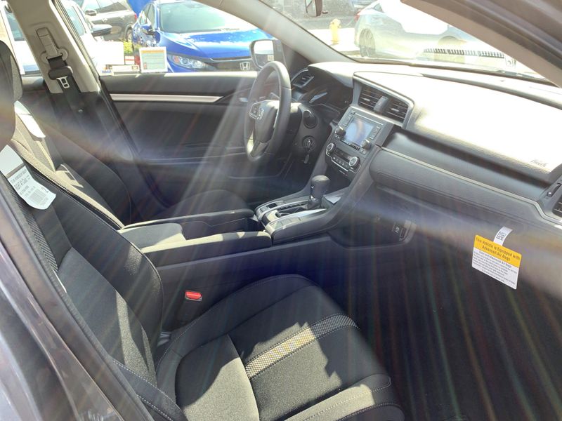 2020 Honda Civic Sedan LX in a White exterior color. BEACH BLVD OF CARS beachblvdofcars.com 