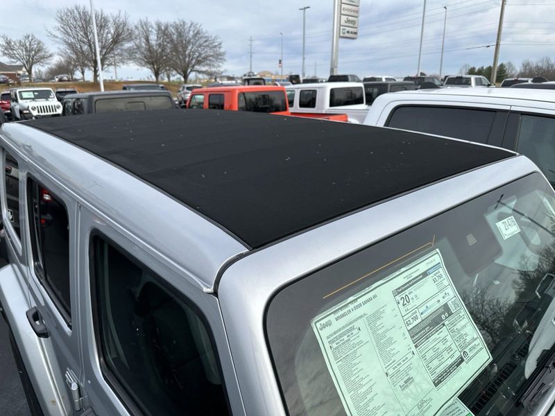 2024 Jeep Wrangler 4-door Sahara in a Silver Zynith Clear Coat exterior color and Blackinterior. Gupton Motors Inc 615-384-2886 guptonmotors.com 