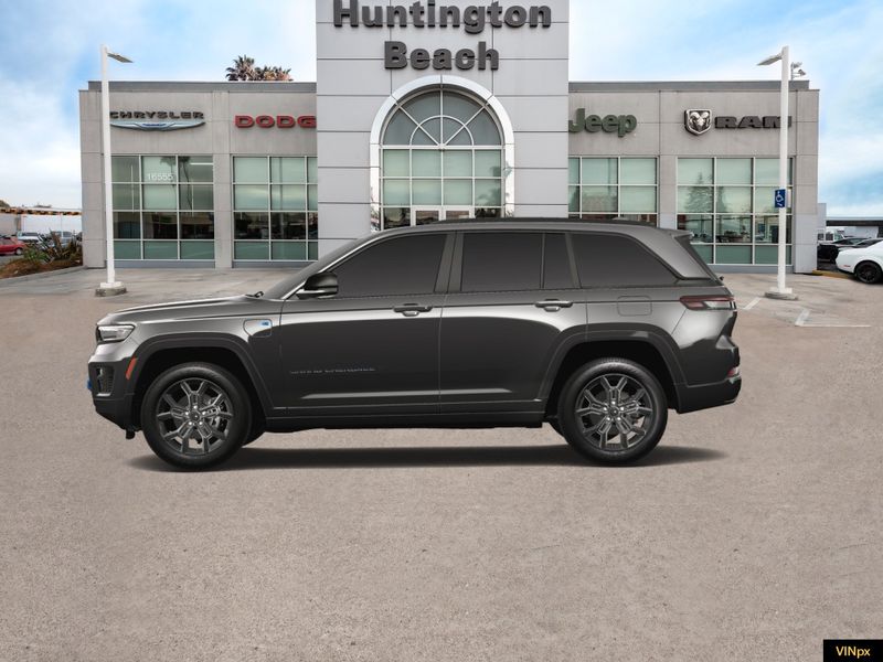 2023 Jeep Grand Cherokee 4xe Base 30th Anniversary 4x4 in a Baltic Gray exterior color and Global Blackinterior. BEACH BLVD OF CARS beachblvdofcars.com 