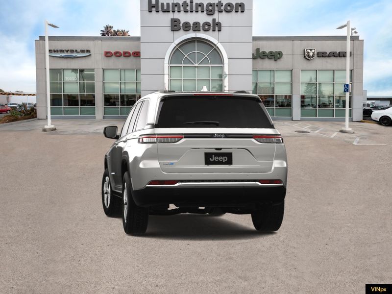 2023 Jeep Grand Cherokee 4xe Base 4x4 in a Bright White exterior color and Global Blackinterior. BEACH BLVD OF CARS beachblvdofcars.com 