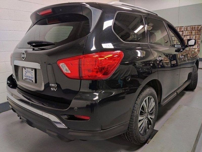 2019 Nissan Pathfinder SV AWD in a Magnetic Black Pearl exterior color. Schmelz Countryside SAAB (888) 558-1064 stpaulsaab.com 