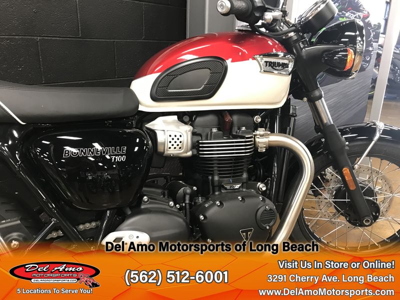 2023 Triumph BONNEVILLE T100  in a CARNIVAL RED/FUSION WHITE exterior color. Del Amo Motorsports of Long Beach (562) 362-3160 delamomotorsports.com 