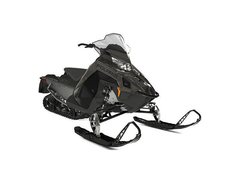 2024 Polaris Switchback XC in a Gloss Black/Shadow Gray exterior color. New England Powersports 978 338-8990 pixelmotiondemo.com 