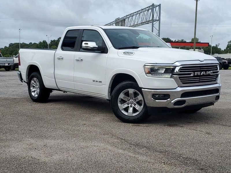 2020 RAM 1500 Laramie in a Bright White Clear Coat exterior color and Blackinterior. Johnson Dodge 601-693-6343 pixelmotiondemo.com 
