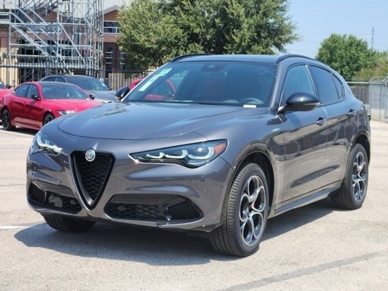 2024 Alfa Romeo Stelvio Veloce in a Vesuvio Gray Metallic exterior color and Blackinterior. Northside Imports Houston 281-475-4549 northsideimportshouston.com 