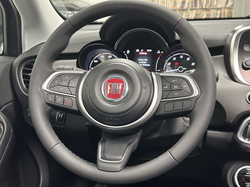 2023 Fiat 500x Pop Awd in a Grigio Moda (Graphite Gray Metallic) exterior color and Black Heated Seatsinterior. Schmelz Countryside Alfa Romeo and Fiat (651) 968-0556 schmelzfiat.com 