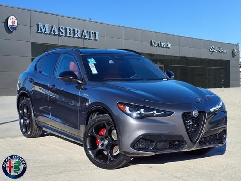 2024 Alfa Romeo Stelvio Veloce in a Vesuvio Gray Metallic exterior color and Blackinterior. Northside Imports Houston 281-475-4549 northsideimportshouston.com 