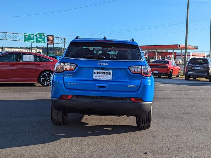 2022 Jeep Compass Latitude 4x4 in a Laser Blue Pearl Coat exterior color and Blackinterior. Johnson Dodge 601-693-6343 pixelmotiondemo.com 