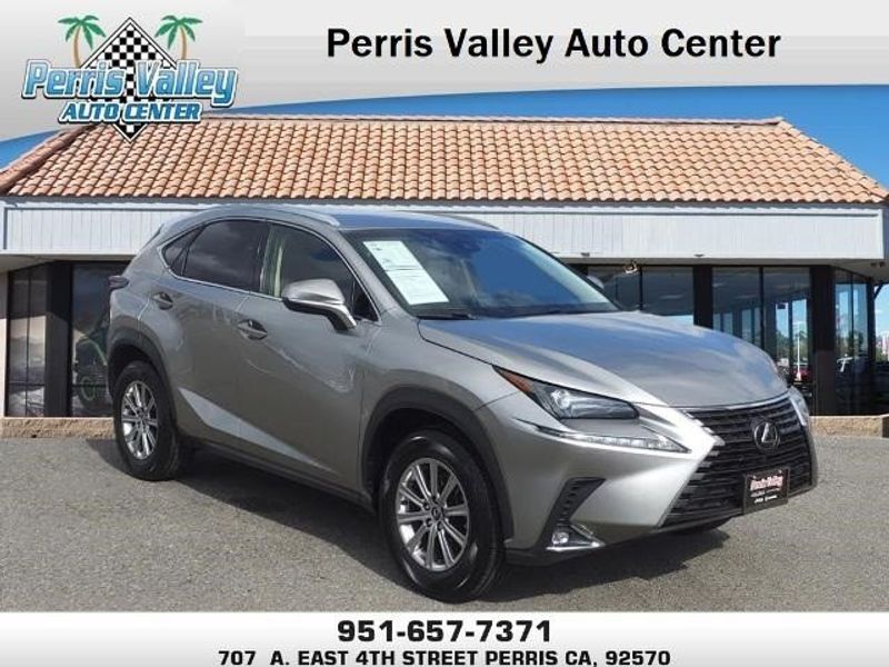 2019 Lexus NX 300 Base in a Atomic Silver exterior color and Rioja Redinterior. Perris Valley Auto Center 951-657-6100 perrisvalleyautocenter.com 
