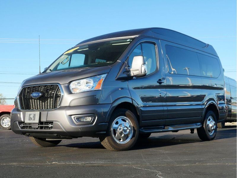 2021 Ford Transit-150 Cargo Van  in a Carbonized Gray Metallic exterior color and Graphiteinterior. Paul Sherry Chrysler Dodge Jeep RAM (937) 749-7061 sherrychrysler.net 