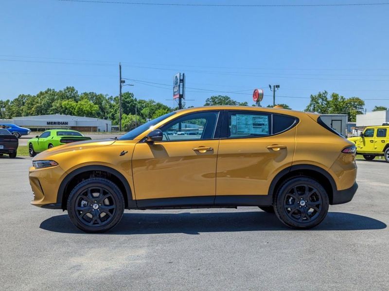 2023 Dodge Hornet Gt Awd in a Acapulco Gold exterior color and Blackinterior. Johnson Dodge 601-693-6343 pixelmotiondemo.com 