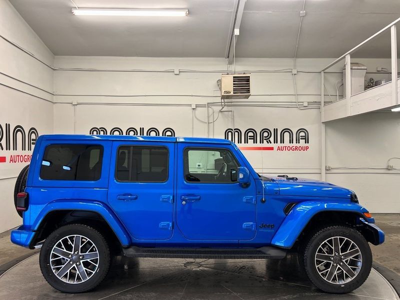 2022 Jeep Wrangler 4xe Unlimited High Altitude 4x4 in a Hydro Blue Pearl Coat exterior color and Blackinterior. Marina Chrysler Dodge Jeep RAM (855) 616-8084 marinadodgeny.com 