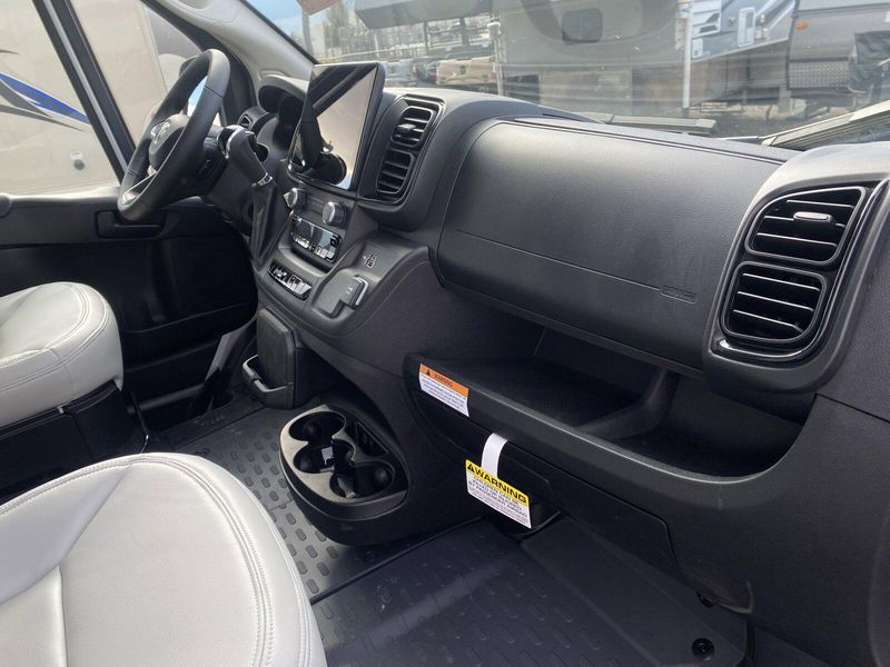 2024 ROADTREK Pivot  in a Silver Metallic exterior color and Chestnut Browninterior. Legacy Powersports 541-663-1111 legacypowersports.net 