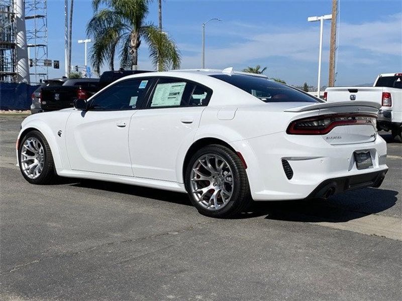 2023 Dodge Charger Srt Hellcat Widebody Jailbreak in a White Knuckle exterior color and Demonic Red/Blackinterior. McPeek