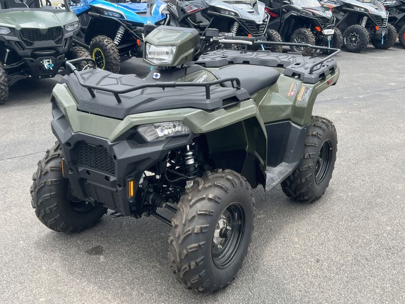 2024 POLARIS SPORTSMAN 450 HO EPS SAGE GREEN in a GREEN exterior color. Family PowerSports (877) 886-1997 familypowersports.com 
