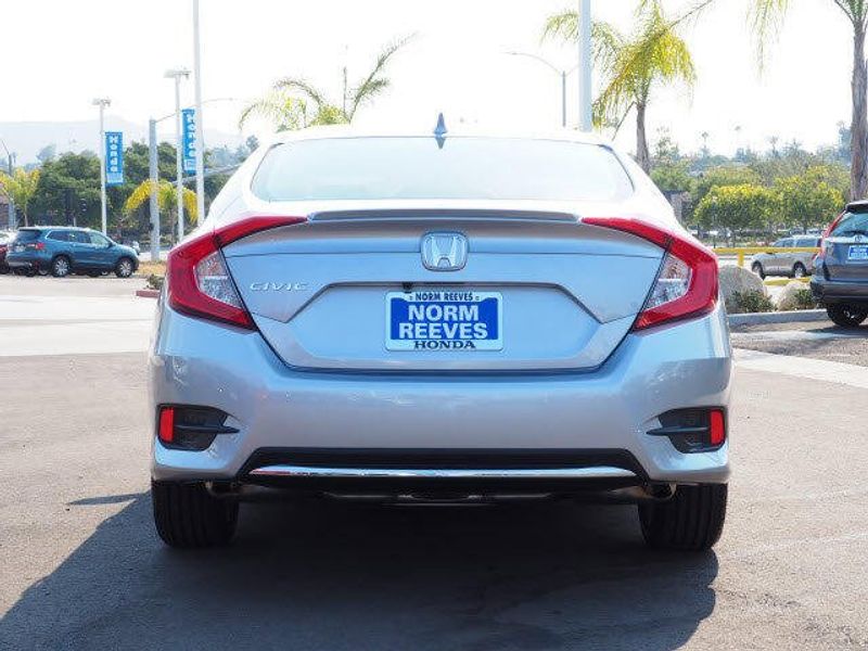 2020 Honda Civic Sedan EX in a Lunar Silver Metallic exterior color and Blackinterior. BEACH BLVD OF CARS beachblvdofcars.com 