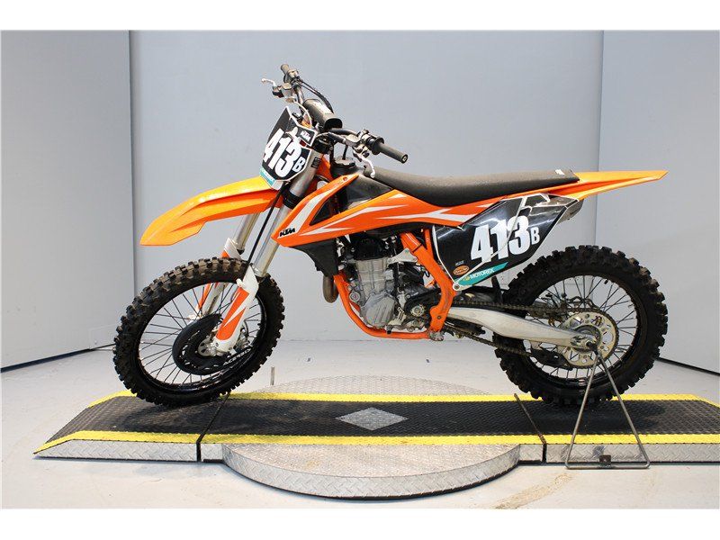 2018 KTM SX 450 F in a Orange exterior color. New England Powersports 978 338-8990 pixelmotiondemo.com 