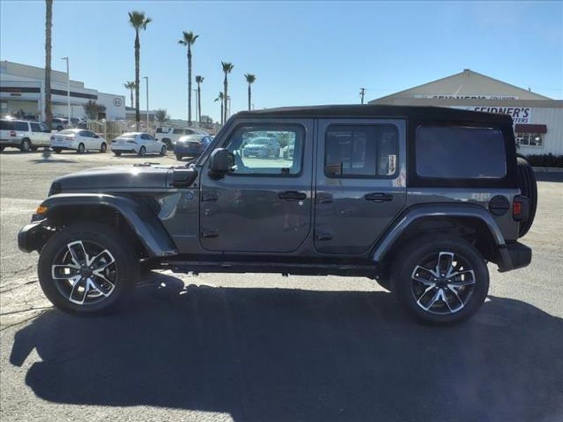 2024 Jeep Wrangler Sport S 4xe in a Granite Crystal Metallic Clear Coat exterior color and Blackinterior. Perris Valley Auto Center 951-657-6100 perrisvalleyautocenter.com 