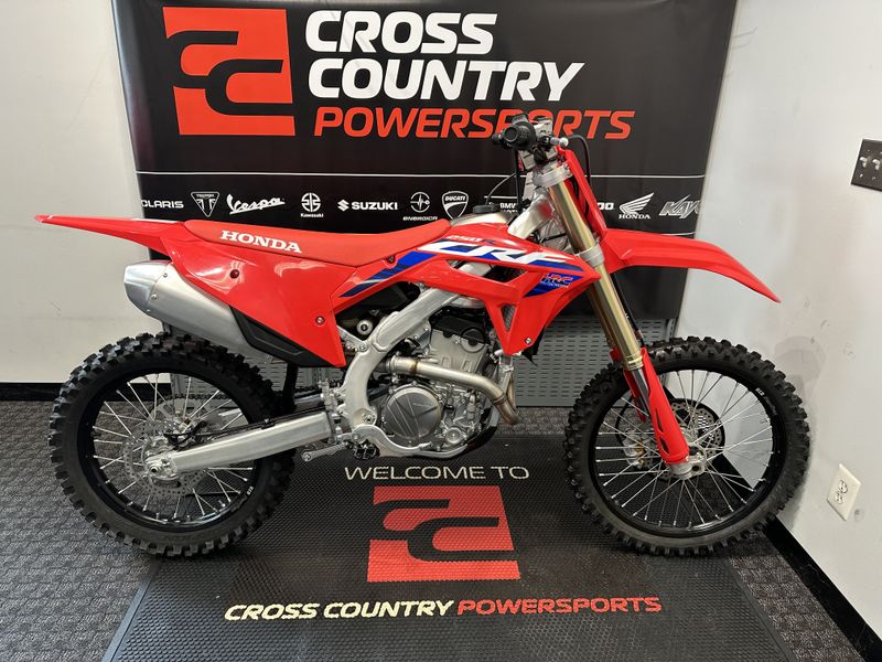 2024 Honda CRF250R in a RED exterior color. Cross Country Powersports 732-491-2900 crosscountrypowersports.com 