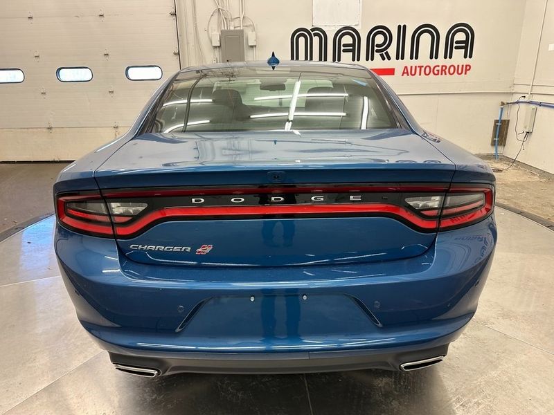 2023 Dodge Charger SXT Awd in a Frostbite exterior color and Blackinterior. Marina Auto Group (855) 564-8688 marinaautogroup.com 