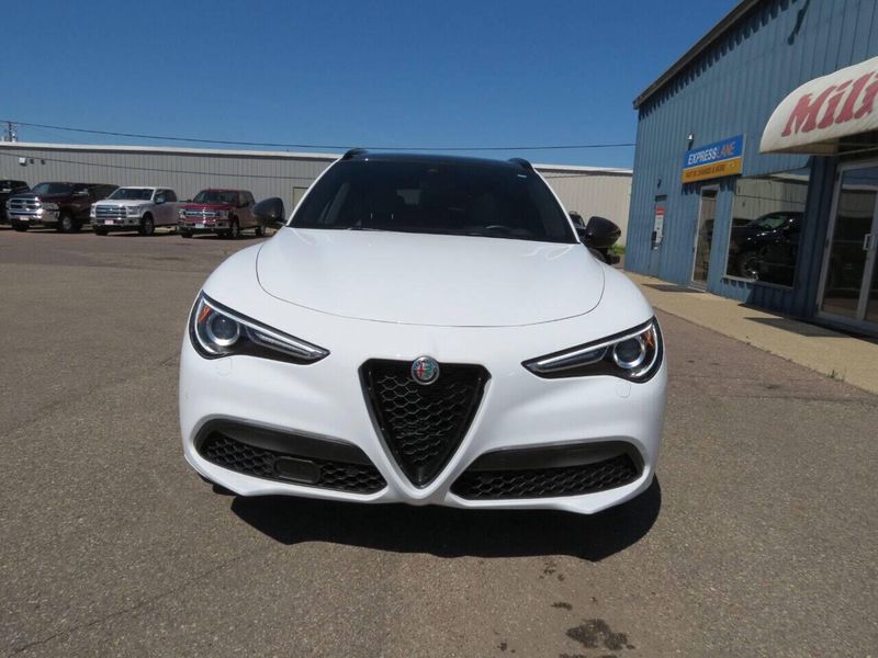 2021 Alfa Romeo Stelvio Ti Sport AWD 4dr Crossover in a White exterior color and Blackinterior. Militello Motors ​507-200-4344 militellomotors.net 