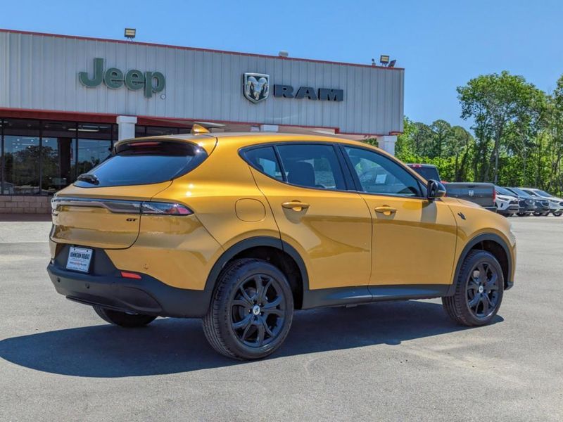 2023 Dodge Hornet Gt Awd in a Acapulco Gold exterior color and Blackinterior. Johnson Dodge 601-693-6343 pixelmotiondemo.com 