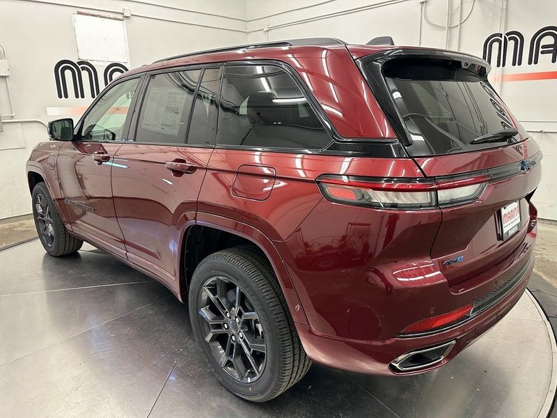 2024 Jeep Grand Cherokee Anniversary Edition 4xe in a Velvet Red Pearl Coat exterior color and Global Blackinterior. Marina Auto Group (855) 564-8688 marinaautogroup.com 