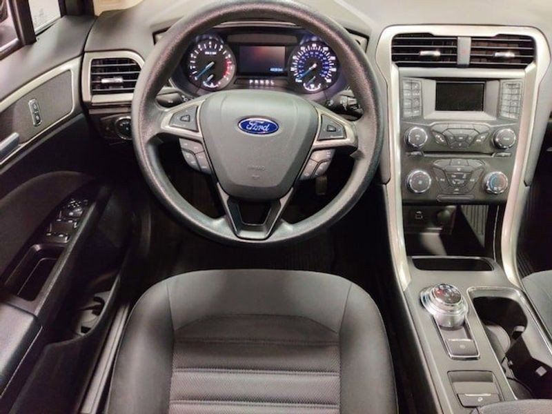 2017 FORD Fusion SE in a BLACK exterior color and  Ebonyinterior. Schmelz Countryside SAAB (888) 558-1064 stpaulsaab.com 