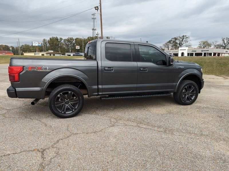 2020 Ford F-150 Lariat in a Magnetic Metallic exterior color and Blackinterior. Johnson Dodge 601-693-6343 pixelmotiondemo.com 