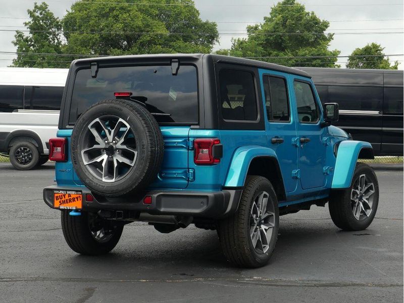 2024 Jeep Wrangler 4-door Sport S 4xe in a Bikini Pearl Coat exterior color and Blackinterior. Paul Sherry Chrysler Dodge Jeep RAM (937) 749-7061 sherrychrysler.net 