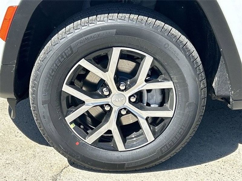 2024 Jeep Grand Cherokee Limited 4x4 in a Bright White Clear Coat exterior color. McPeek