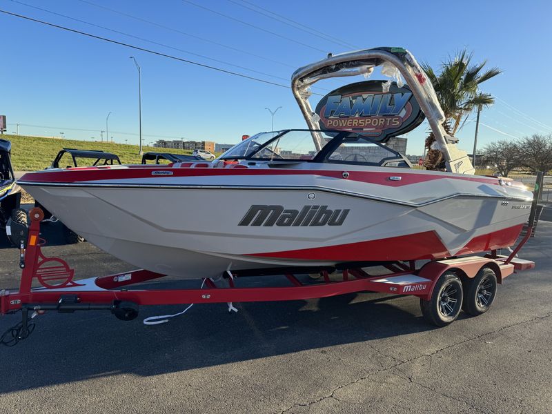 2024 MALIBU WAKESETTER 22 LSV  RED  LIGHT GRAPHITE  in a RED/GREY exterior color. Family PowerSports (877) 886-1997 familypowersports.com 