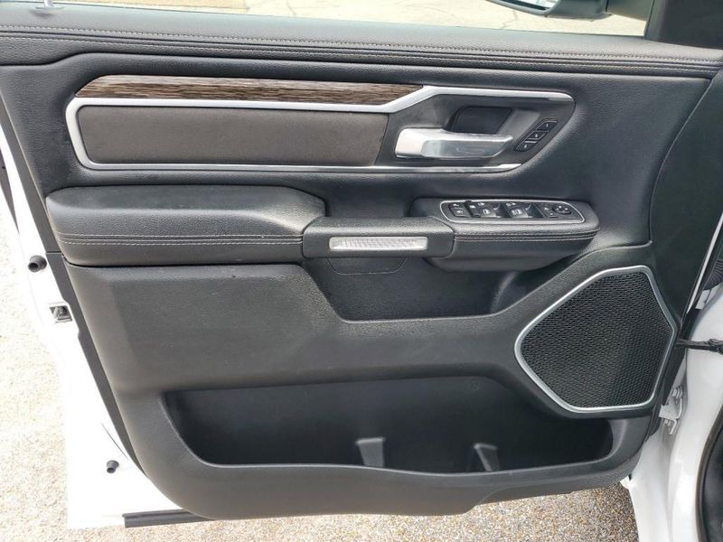 2020 RAM 1500 Laramie in a Bright White Clear Coat exterior color and Blackinterior. Johnson Dodge 601-693-6343 pixelmotiondemo.com 