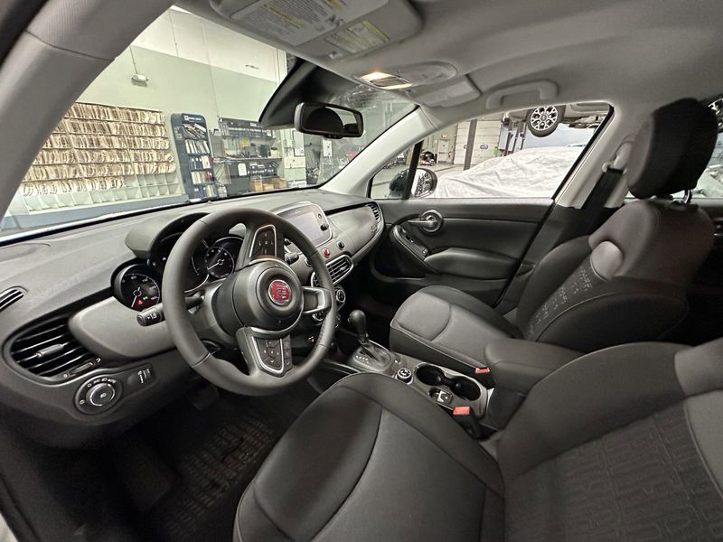 2023 Fiat 500x Pop Awd in a Bianco Gelato (White Clear Coat) exterior color and Blackinterior. Schmelz Countryside Alfa Romeo and Fiat (651) 968-0556 schmelzfiat.com 