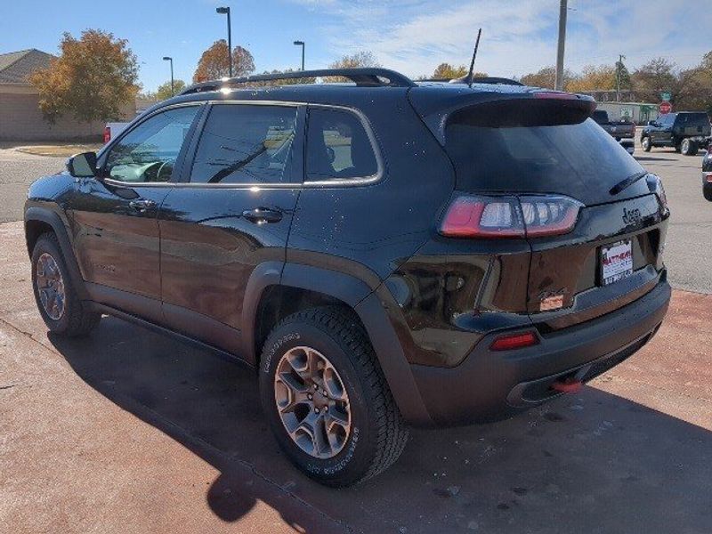 2022 Jeep Cherokee Trailhawk in a Diamond Black Crystal Pearl Coat exterior color and Blackinterior. Matthews Chrysler Dodge Jeep Ram 918-276-8729 cyclespecialties.com 