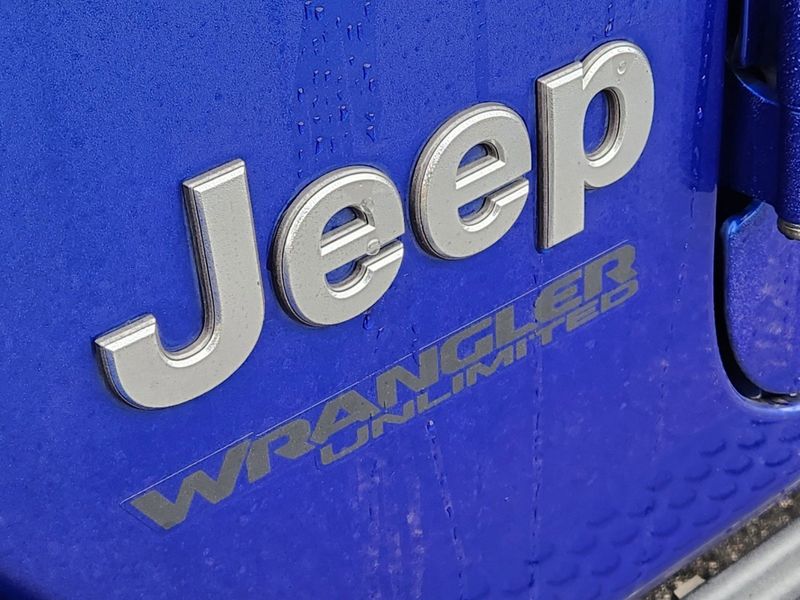 2020 Jeep Wrangler Unlimited Sahara in a Ocean Blue Metallic Clear Coat exterior color and Blackinterior. Elder Chrysler Dodge Jeep Ram 9032920419 elderchryslerdodgejeep.com 
