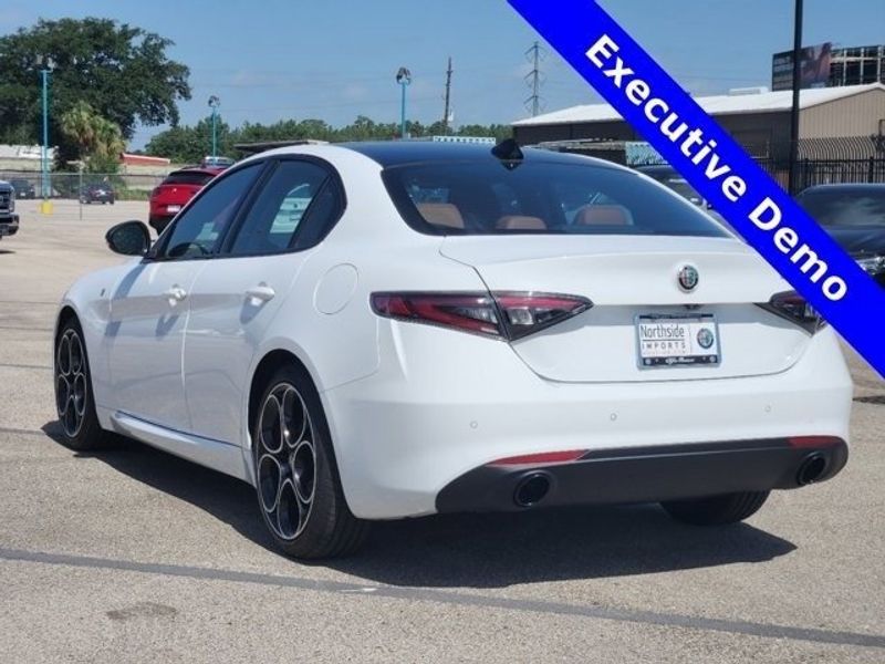 2024 Alfa Romeo Giulia Ti in a Alfa White exterior color and Saddle Browninterior. Northside Imports Houston 281-475-4549 northsideimportshouston.com 