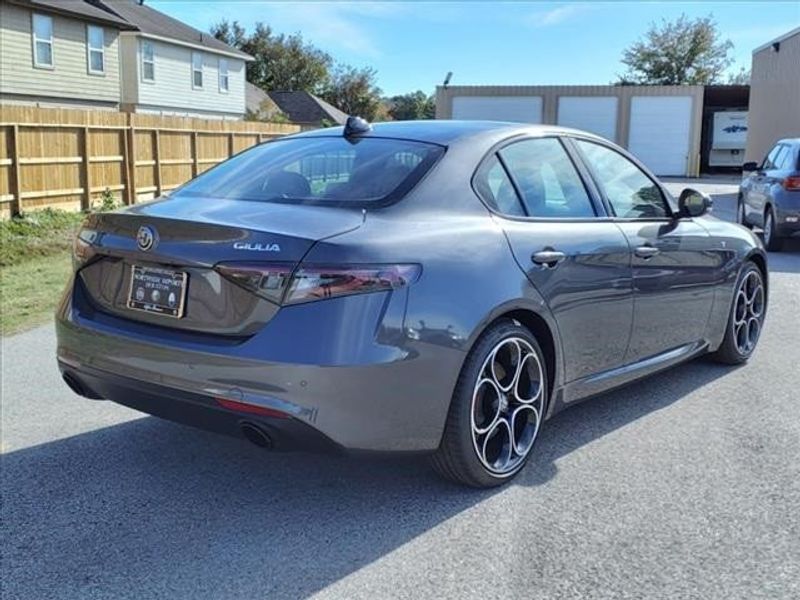 2024 Alfa Romeo Giulia Ti in a Vesuvio Gray Metallic exterior color and Blackinterior. Northside Imports Houston 281-475-4549 northsideimportshouston.com 