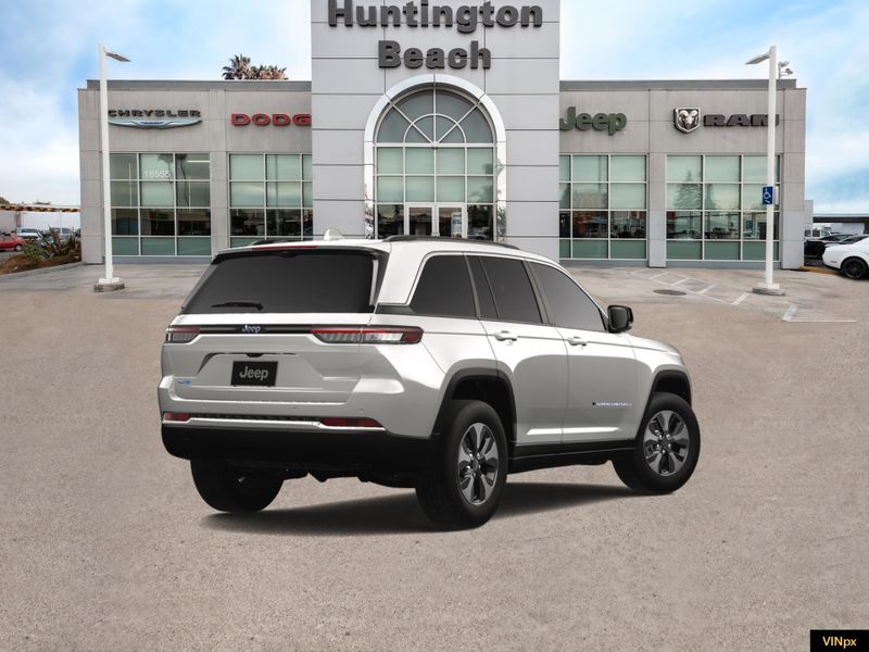 2023 Jeep Grand Cherokee 4xe Base 4x4 in a Bright White exterior color and Global Blackinterior. BEACH BLVD OF CARS beachblvdofcars.com 