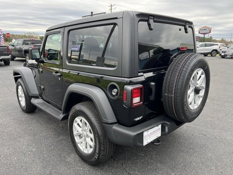 2023 Jeep Wrangler 2-door Sport S 4x4 in a Black Clear Coat exterior color and Blackinterior. Lakeshore CDJR Seaford 302-213-6058 lakeshorecdjr.com 