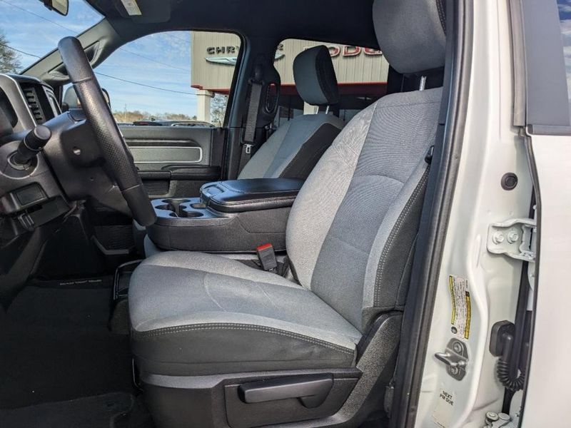 2021 RAM 2500 Big Horn in a Bright White Clear Coat exterior color and Diesel Gray/Blackinterior. Johnson Dodge 601-693-6343 pixelmotiondemo.com 