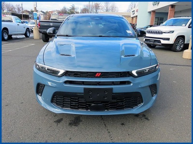 2024 Dodge Hornet R/T Plus in a Blue Steele exterior color and Blackinterior. Papas Jeep Ram In New Britain, CT 860-356-0523 papasjeepram.com 