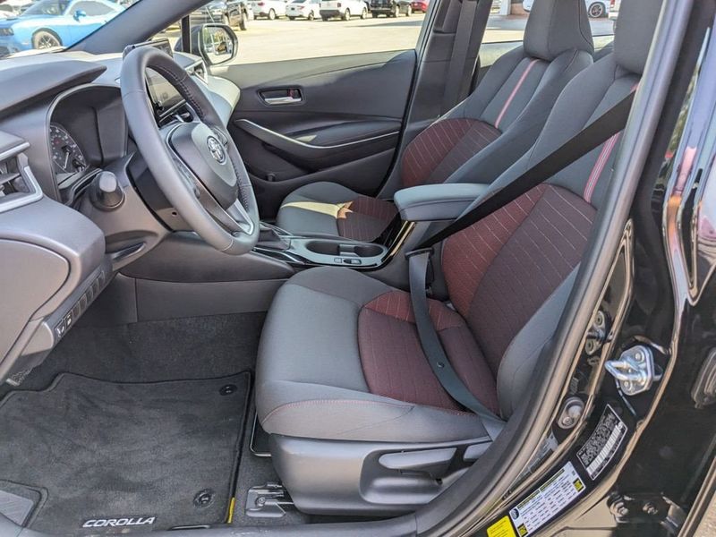 2023 Toyota Corolla SE in a Midnight Black Metallic exterior color and Black/Redinterior. Johnson Dodge 601-693-6343 pixelmotiondemo.com 