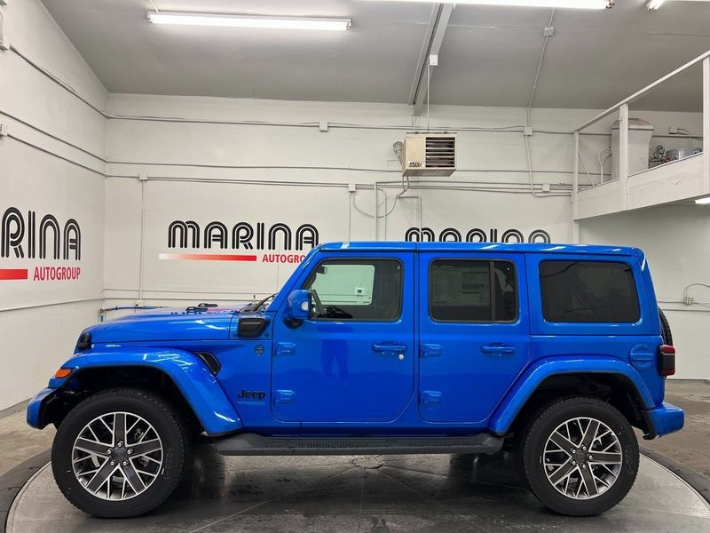 2022 Jeep Wrangler 4xe Unlimited High Altitude 4x4 in a Hydro Blue Pearl Coat exterior color and Blackinterior. Marina Chrysler Dodge Jeep RAM (855) 616-8084 marinadodgeny.com 