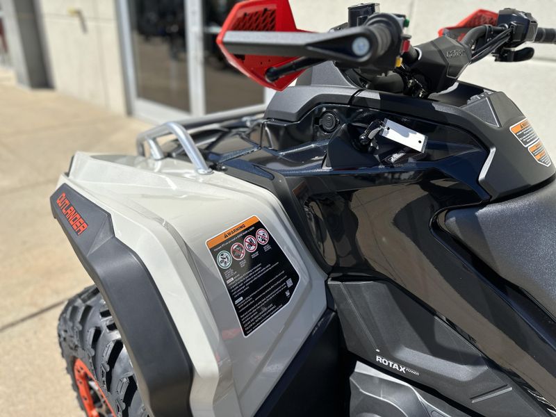 2024 Can-Am OUTLANDER XXC 1000R in a CHALK GREY / RED exterior color. Cross Country Powersports 732-491-2900 crosscountrypowersports.com 