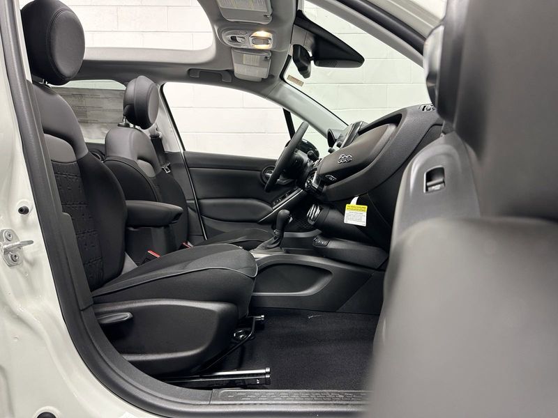 2023 Fiat 500x Pop Awd in a Bianco Gelato (White Clear Coat) exterior color and Blackinterior. Schmelz Countryside Alfa Romeo and Fiat (651) 968-0556 schmelzfiat.com 