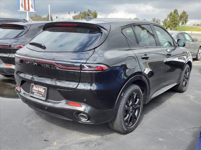 2024 Dodge Hornet R/T in a 8 Ball exterior color and Blackinterior. Perris Valley Auto Center 951-657-6100 perrisvalleyautocenter.com 